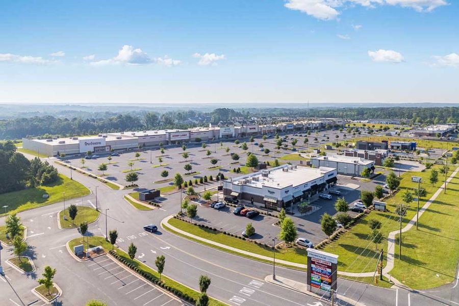 Aerial view of the Terraces at the Exchange community in Indian Land, SC, showing layout and nearby surroundings (Image 13). Aerial view of the Terraces at the Exchange community in Indian Land, SC, showing layout and nearby surroundings (Image 13).