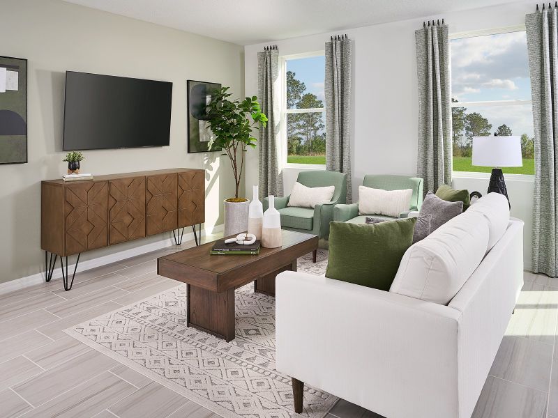 Family room in Windsor floorplan at The Meadow at Crossprairie