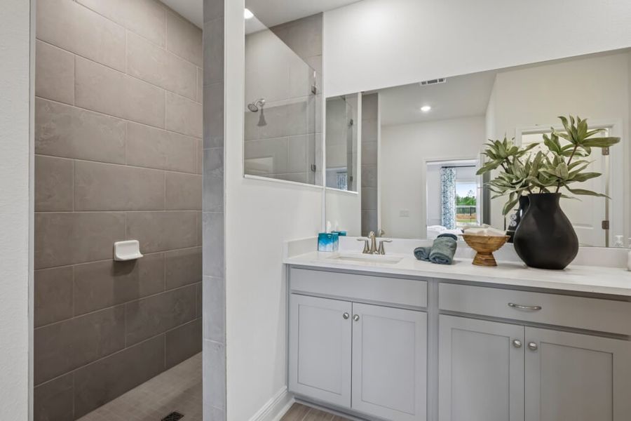 Furnished interior in a model home at Mahogany At Jubilee in Pace (Image 31).