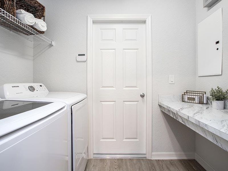 You`ll find convenience built in, such as this laundry room with drop zone - Parker home plan You`ll find convenience built in, such as this laundry room with drop zone - Parker home plan
