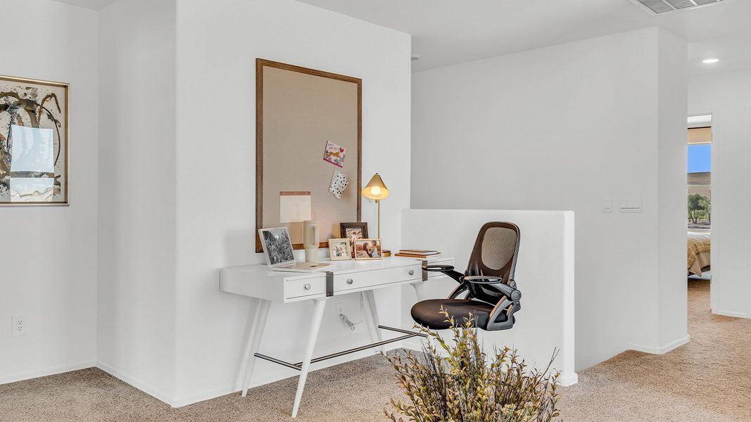 Furnished interior in a model home at Coronet at Gladden Farms in Marana (Image 63).