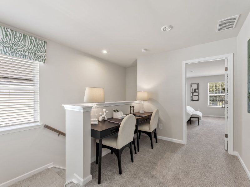 Furnished interior in a model home at Martin Springs - Cottage Series in Lawrenceville (Image 13).