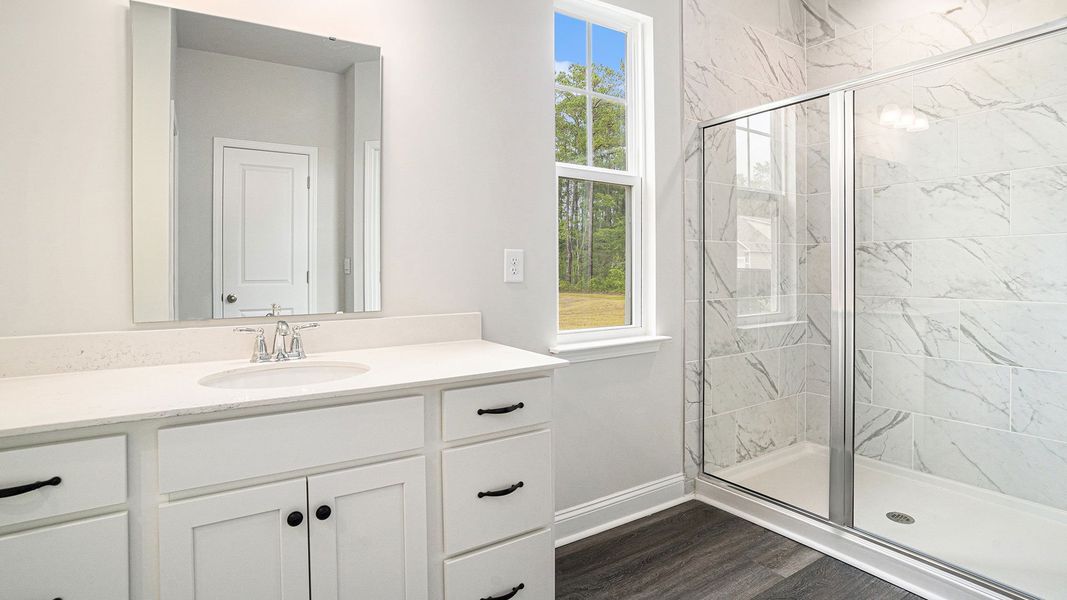 Furnished interior in a model home at Spring View Landing in Loris (Image 8).