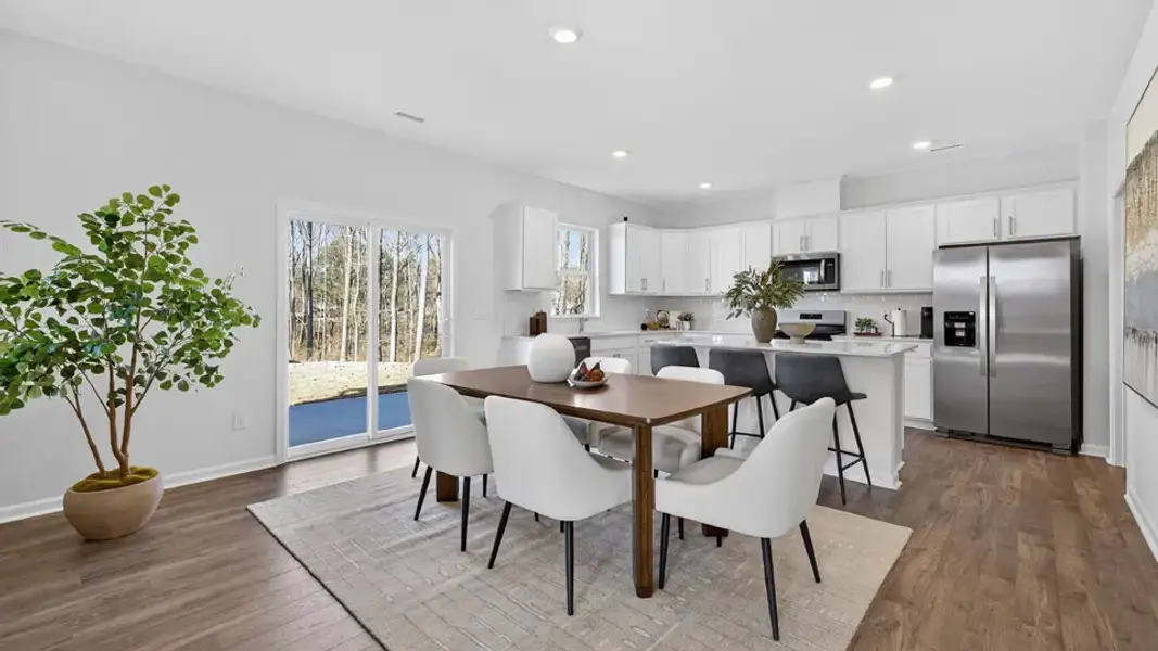 Furnished interior in a model home at Clifton Grove in Zebulon (Image 3).