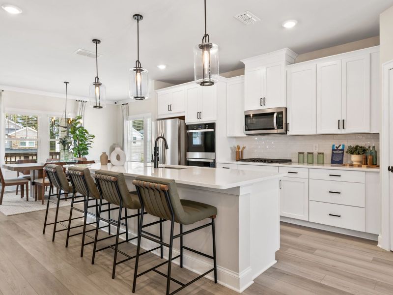Turn the kitchen island into a bar counter for extra seating.