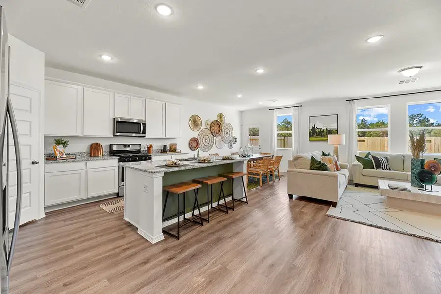 A kitchen with white cabinets. A kitchen with white cabinets.