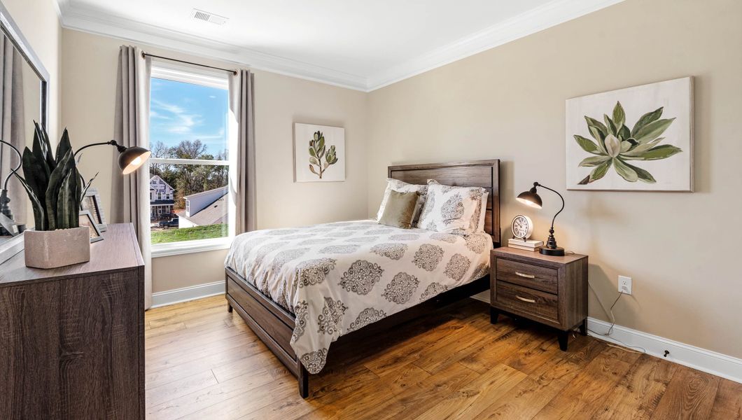 Furnished interior in a model home at Adams Glen in Greenville (Image 19).