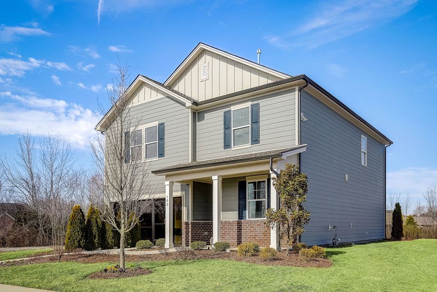 A house with a large front yard. A house with a large front yard.