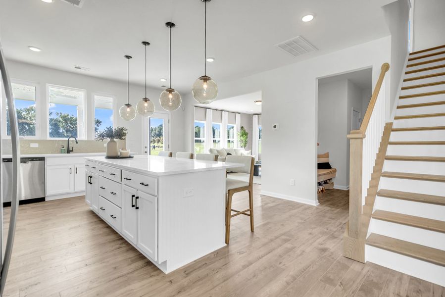 Furnished interior in a model home at Reeves Crossing in St. George (Image 5).