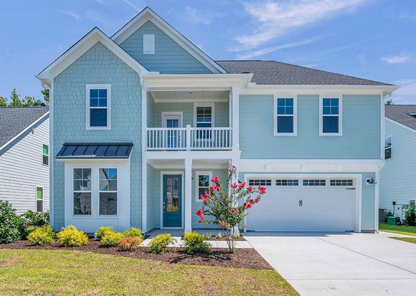 Front exterior of a home in the WyndWater community, located in Hampstead, NC (Image 30).