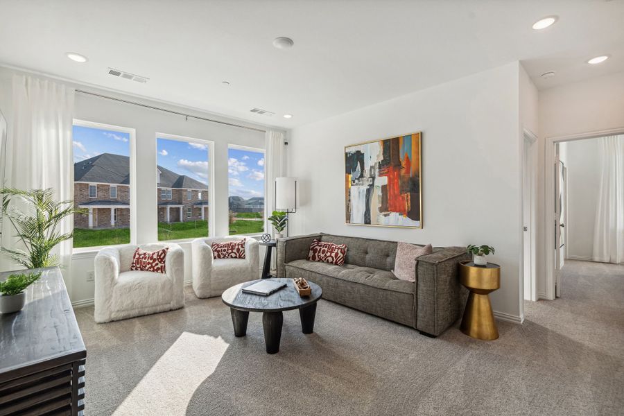 Furnished interior in a model home at Village on Main Street in Frisco (Image 30).
