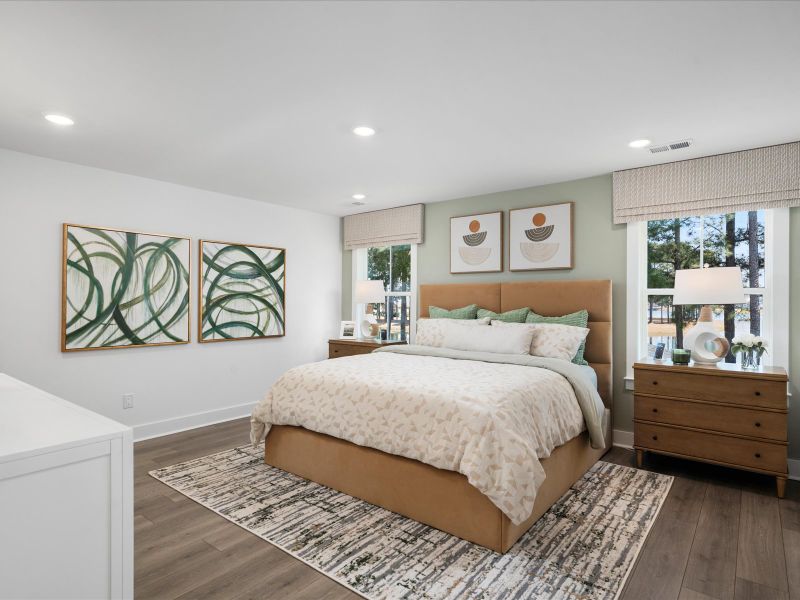 Furnished interior in a model home at The Coves at Lakes of Cane Bay in Summerville (Image 29). Furnished interior in a model home at The Coves at Lakes of Cane Bay in Summerville (Image 29).