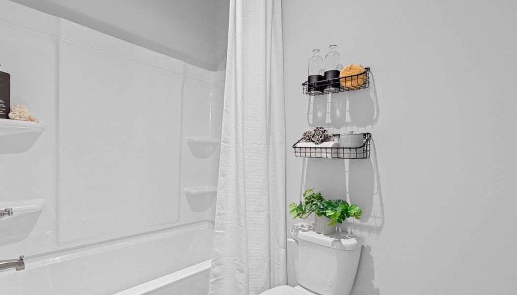 Furnished interior in a model home at Summerlin in Winder (Image 44).