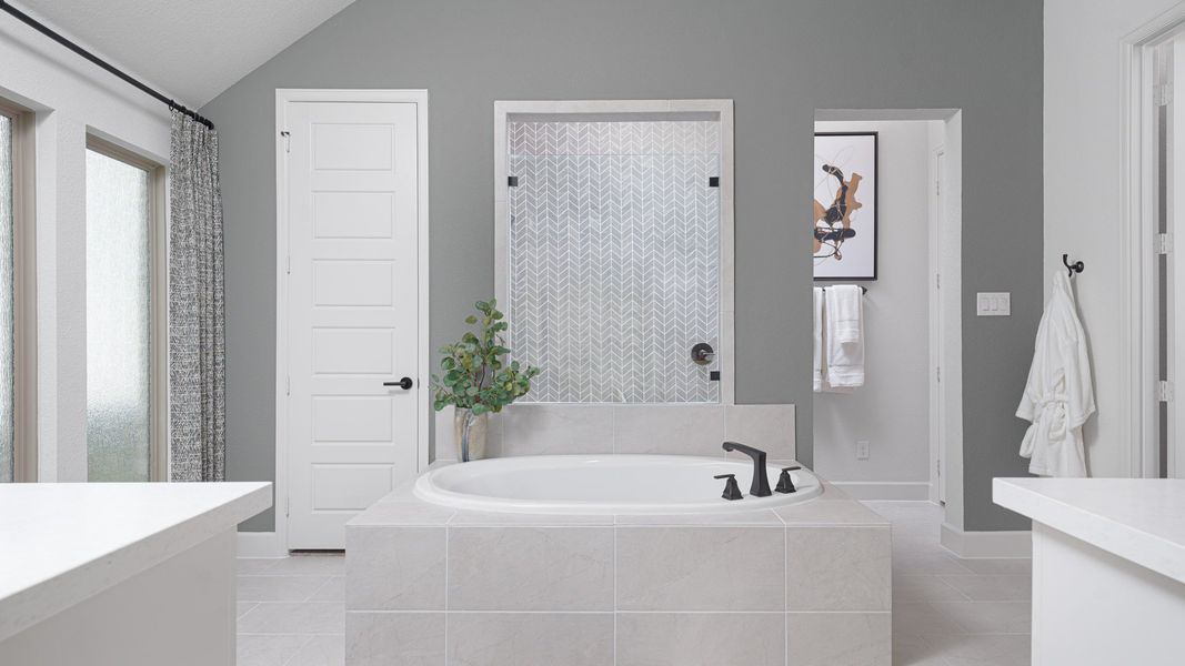 Furnished interior in a model home at Walsh Ranch 60' in Aledo (Image 17).