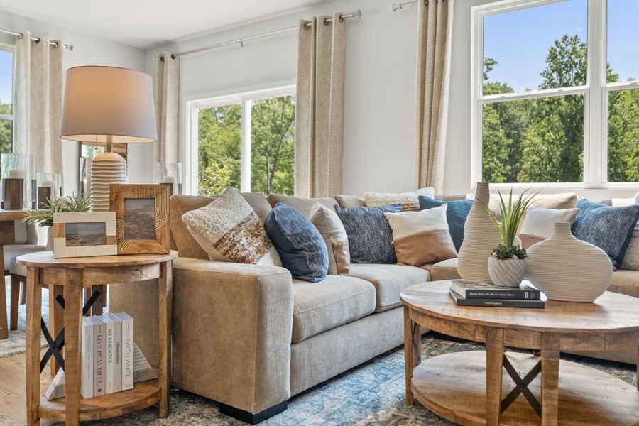 A living room with a couch and a coffee table.
