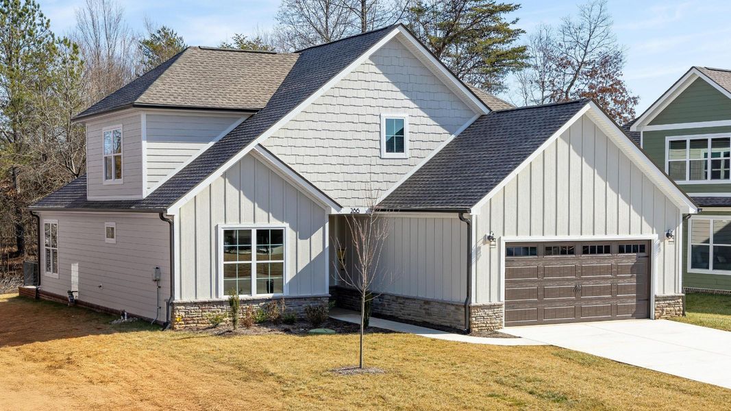 Front exterior of a home in the The Grove at Haven Hill community, located in Lenoir City, TN (Image 12). Front exterior of a home in the The Grove at Haven Hill community, located in Lenoir City, TN (Image 12).