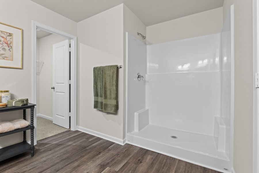 Furnished interior in a model home at Canary Woods in Hopkins (Image 18).