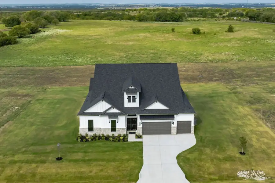 Front exterior of a home in the Cotten Creek community, located in Azle, TX (Image 4). Front exterior of a home in the Cotten Creek community, located in Azle, TX (Image 4).