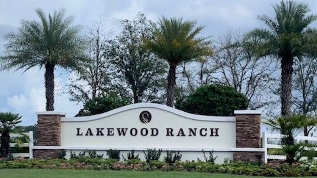 Entrance to the Palm Grove community in Bradenton, FL, featuring signage and landscaping (Image 15).