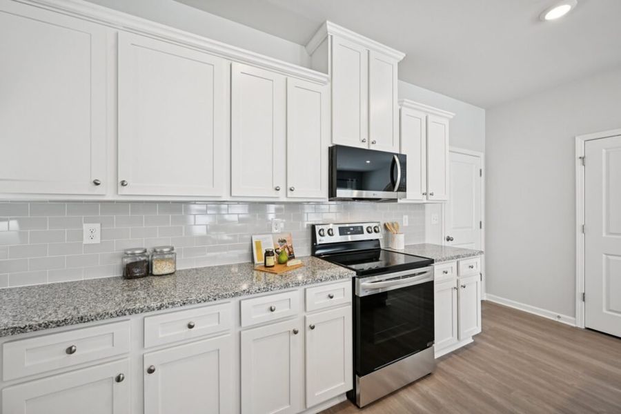 Furnished interior in a model home at Chastain Heights in Woodstock (Image 31).