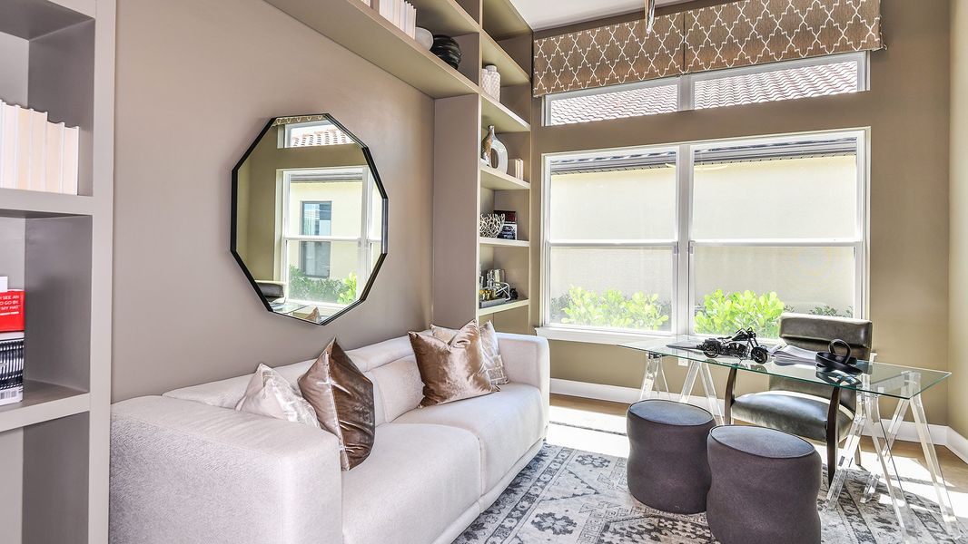 Furnished interior in a model home at Esplanade by the Islands in Naples (Image 57).