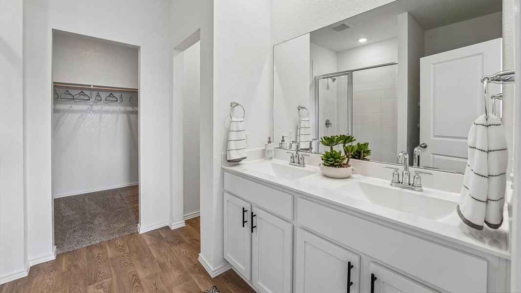 Furnished interior in a model home at Palomino in Manor (Image 37).