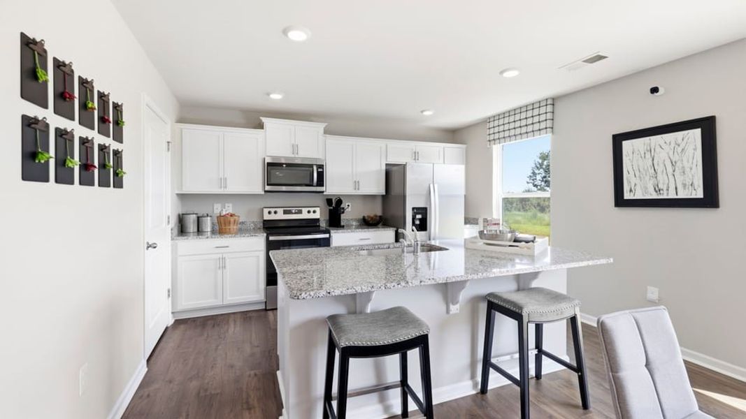 Furnished interior in a model home at Treemont Commons in Wellford (Image 18).
