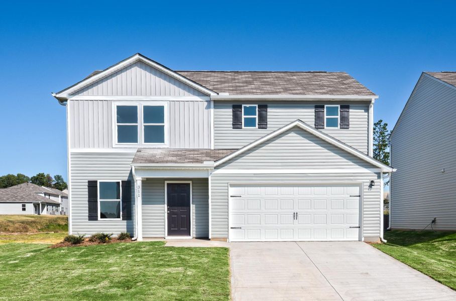 A house with a garage. A house with a garage.
