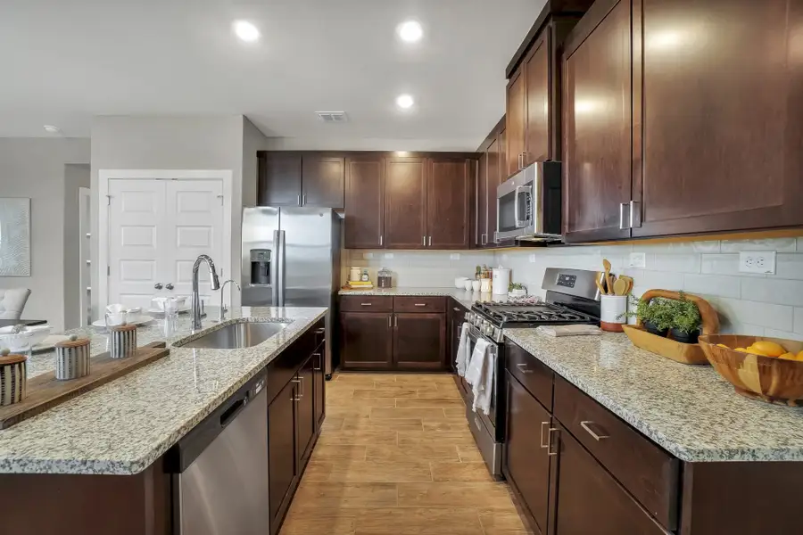 Furnished interior in a model home at Blue Ridge Ranch in San Antonio (Image 6).