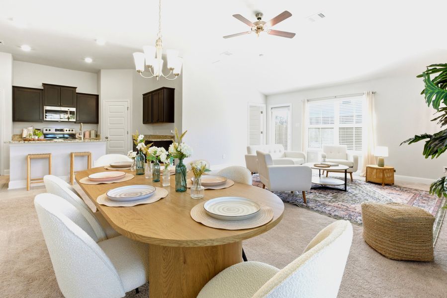 Furnished interior in a model home at Kiber Reserve in Angleton (Image 6).
