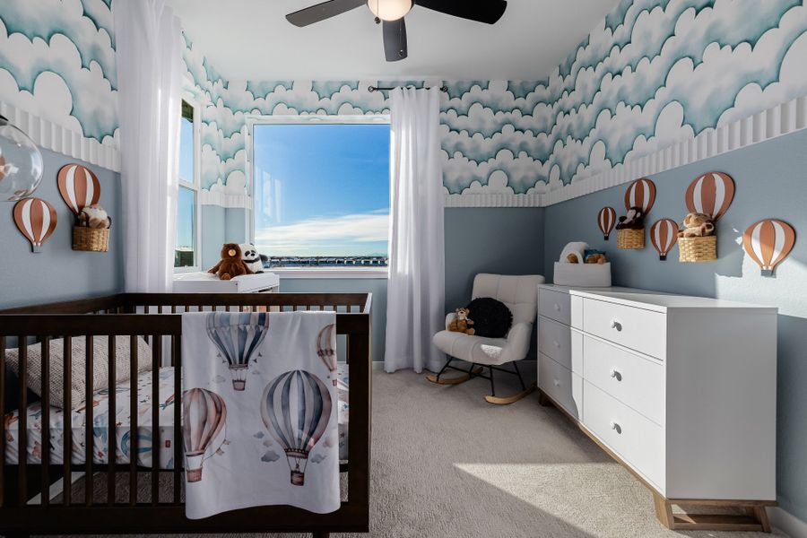 Furnished interior in a model home at Painted Prairie in Aurora (Image 63).