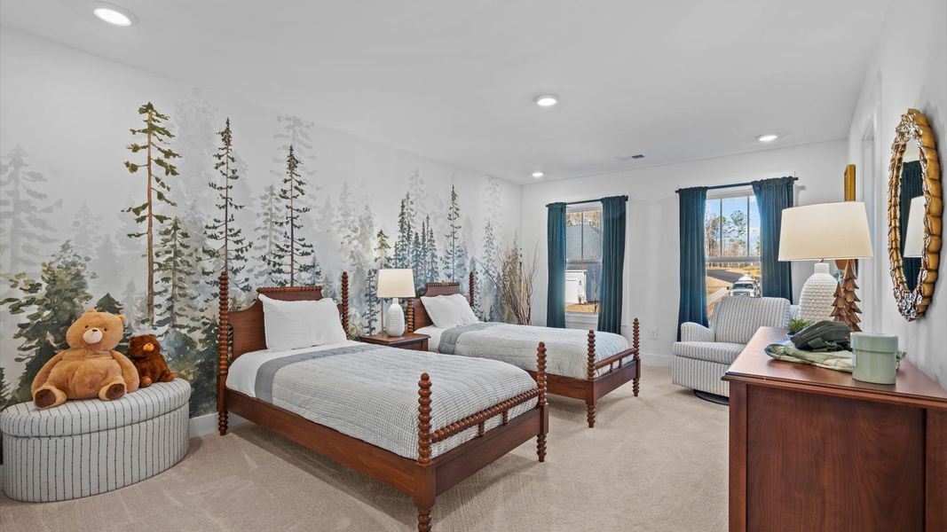 Tasteful bedroom with plush carpet, a walk-in closet, and large windows for abundant natural light in Spartanburg, SC