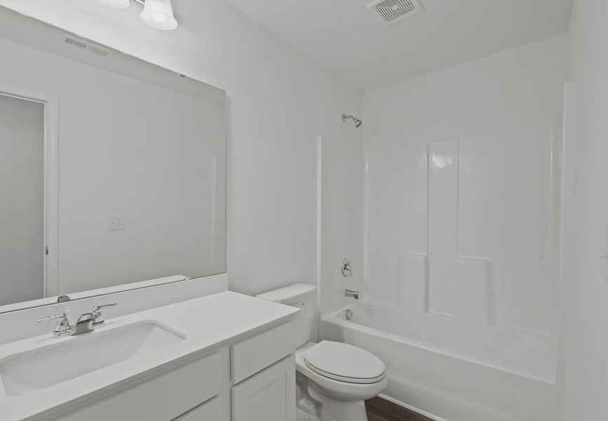 Furnished interior in a model home at Castlewood South in Taylor (Image 14).