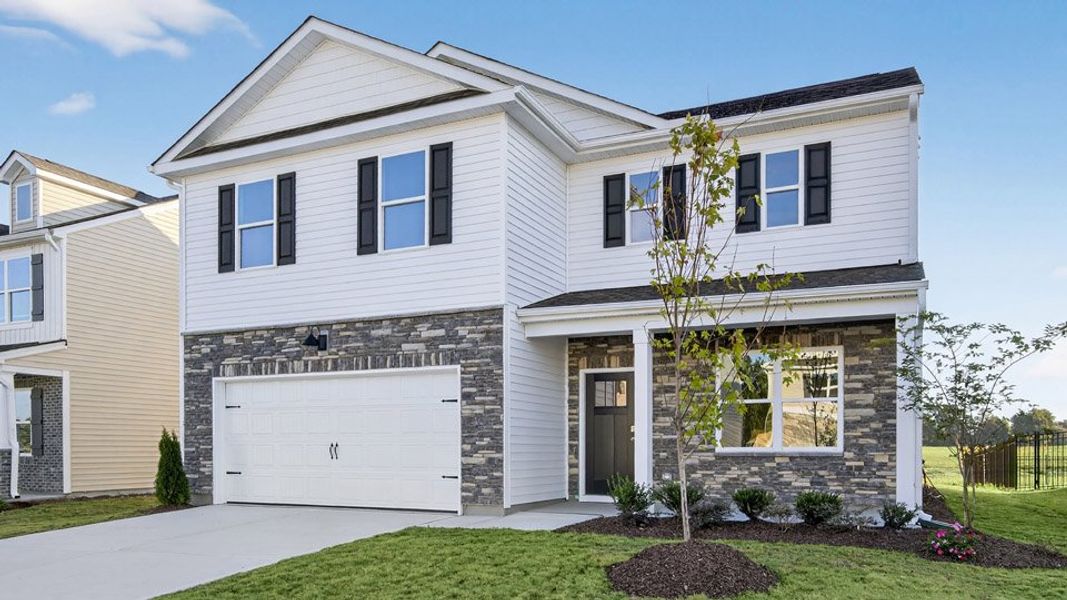Front exterior of a home in the Honeycutt Oaks community, located in Angier, NC (Image 11).