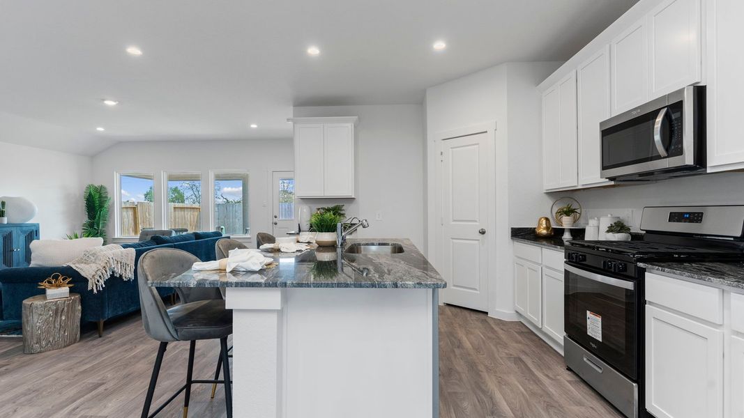Furnished interior in a model home at August Trails in Needville (Image 14).
