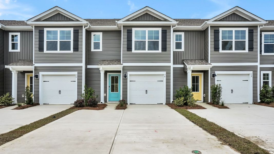 Front exterior of a home in the The Landing at Sidbury Station community, located in Castle Hayne, NC (Image 5).