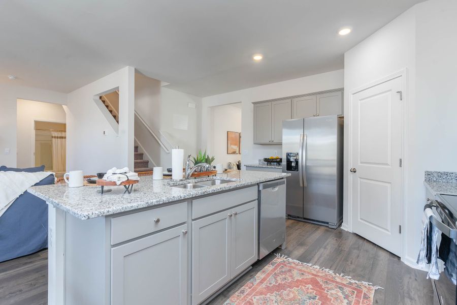 Furnished interior in a model home at Island Green in Myrtle Beach (Image 27).