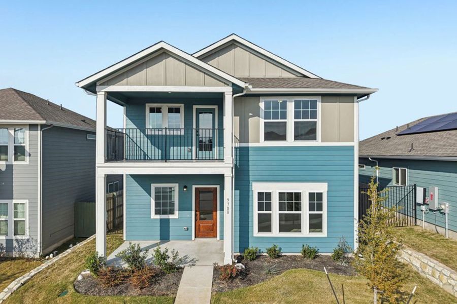 Front exterior of a home in the Whisper Valley community, located in Manor, TX (Image 3). Front exterior of a home in the Whisper Valley community, located in Manor, TX (Image 3).