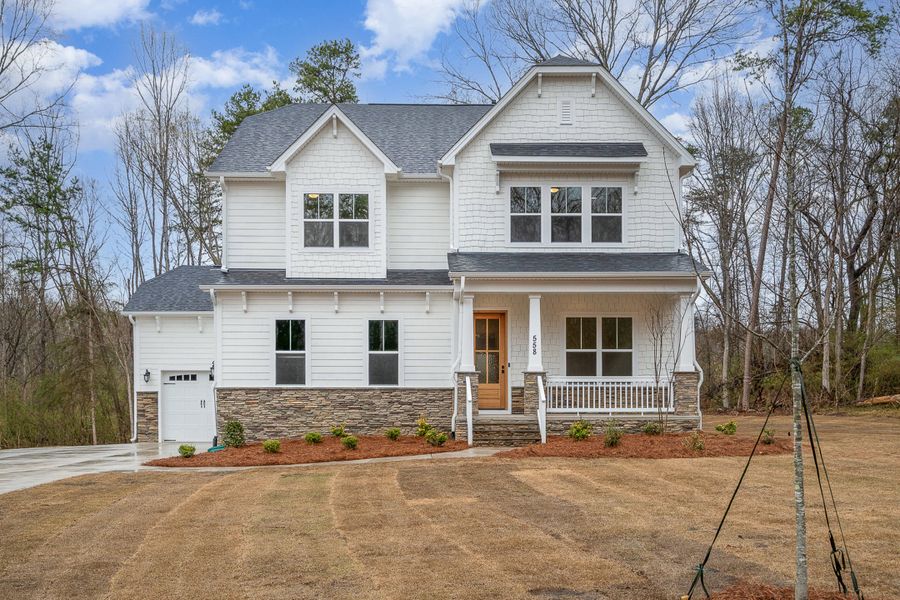 Front exterior of a home in the Edmunds Farm community, located in Clover, SC (Image 1). Front exterior of a home in the Edmunds Farm community, located in Clover, SC (Image 1).