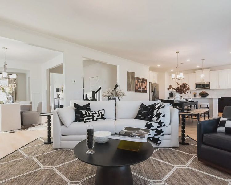 Furnished interior in a model home at Clark Farms in Flowery Branch (Image 6).