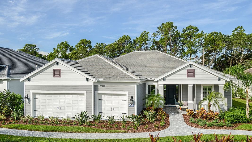 Front exterior of a home in the Grand Palm Real Estate and Homes for Sale in Venice, FL - Neal Communities community, located in Venice, FL (Image 14). Front exterior of a home in the Grand Palm Real Estate and Homes for Sale in Venice, FL - Neal Communities community, located in Venice, FL (Image 14).
