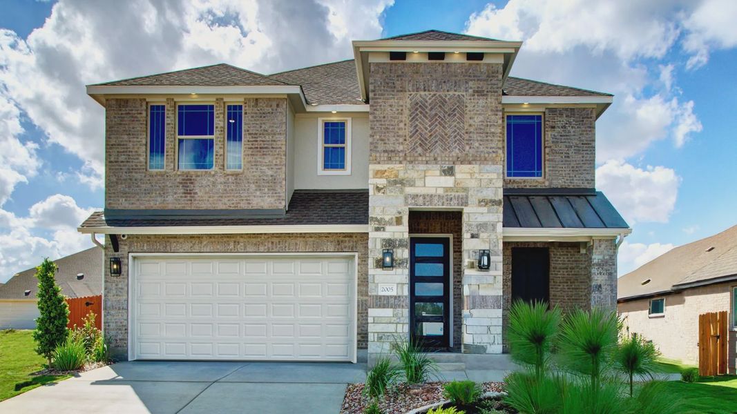 Front exterior of a home in the Stream Waters community, located in Seguin, TX (Image 3).