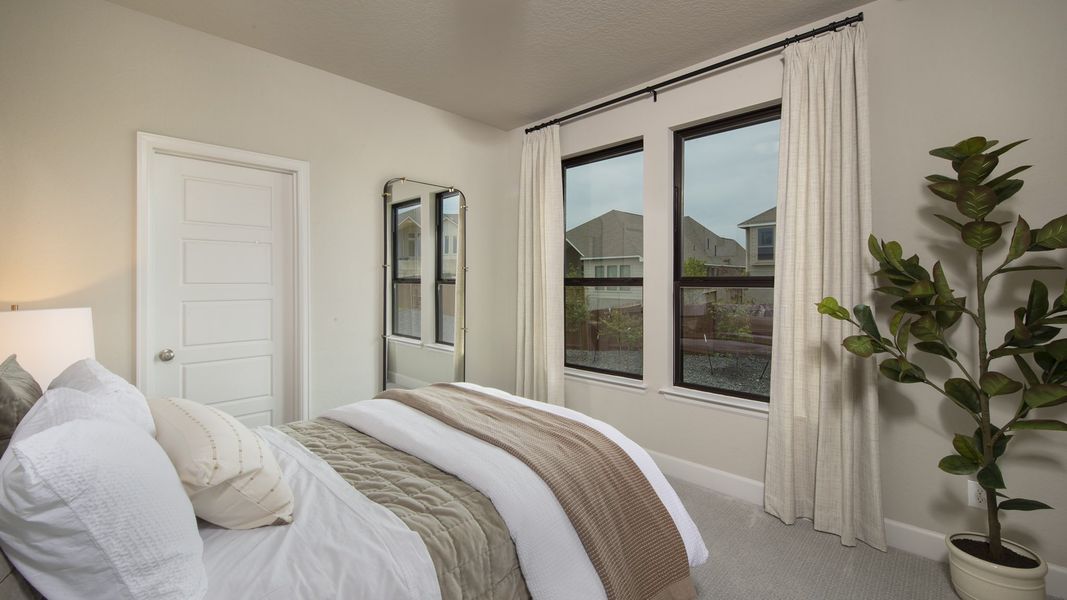 Furnished interior in a model home at Homestead 55' in Schertz (Image 21).