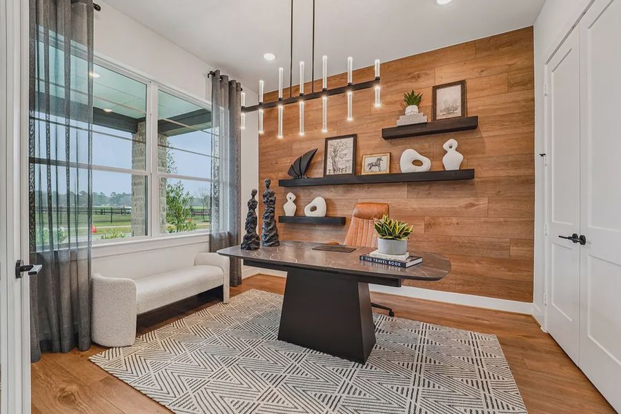 Furnished interior in a model home at Steward Estates in Conroe (Image 7).