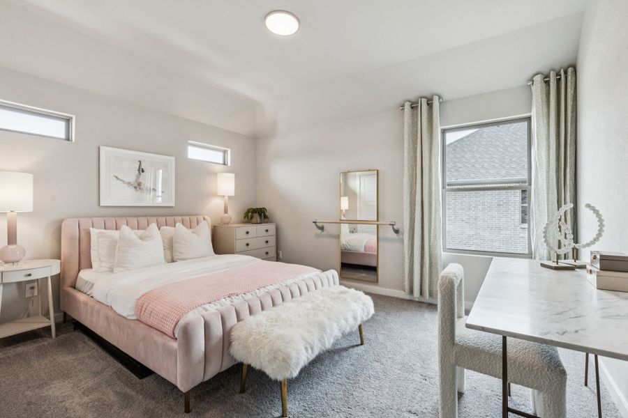 REPRESENTATIVE PHOTO – Bedroom in a Lakehaven Wimbledon model home in Farmersville TX by Trophy Signature Homes