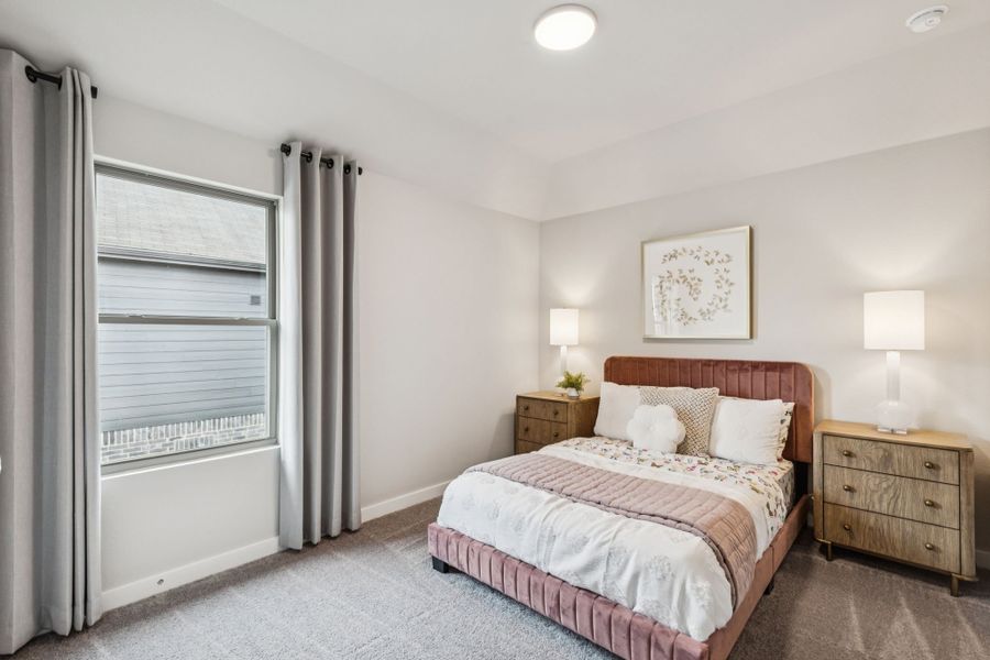 REPRESENTATIVE PHOTO – Bedroom in a Lakehaven Oak model home in Farmersville TX by Trophy Signature Homes