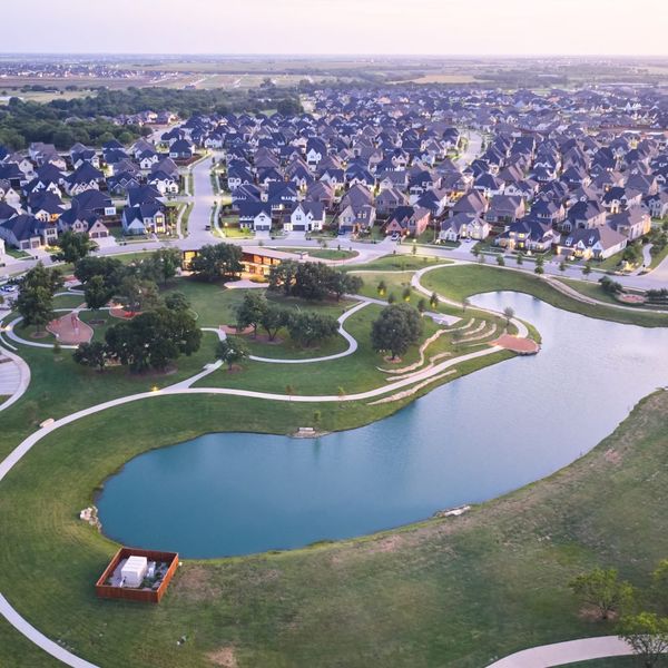 Aerial view of the Windsong Ranch community in Prosper, TX, showing layout and nearby surroundings (Image 7). Aerial view of the Windsong Ranch community in Prosper, TX, showing layout and nearby surroundings (Image 7).
