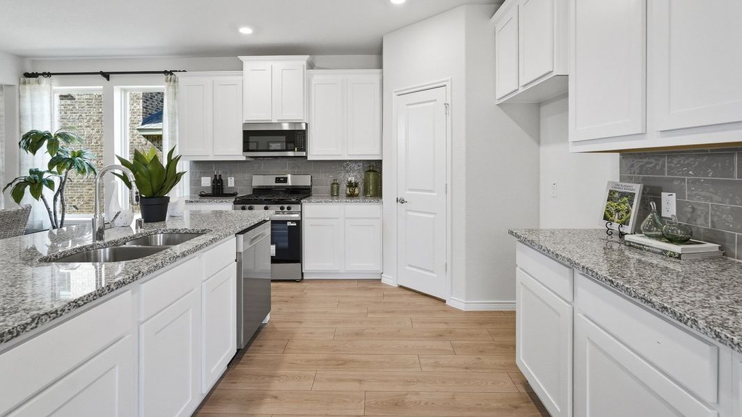 Furnished interior in a model home at The Woods at Lindsey Place in Anna (Image 11).
