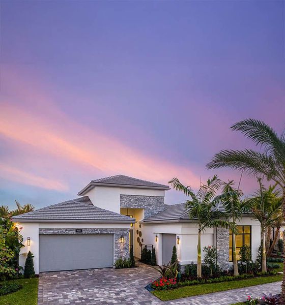 Front exterior of a home in the Valencia Del Mar (55+) community, located in Boynton Beach, FL (Image 4).