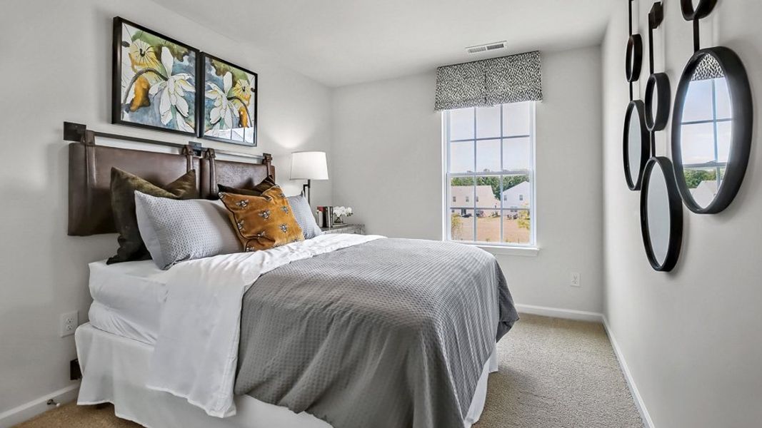 Furnished interior in a model home at The Townes at Prestleigh in Wake Forest (Image 29).